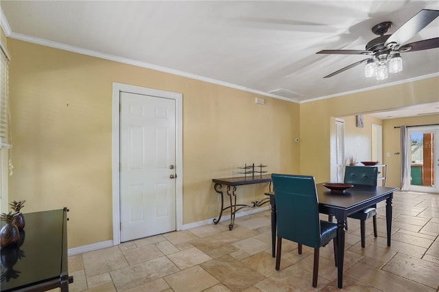 dining room with crown molding and ceiling fan