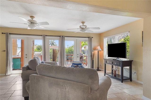 living room with french doors and ceiling fan