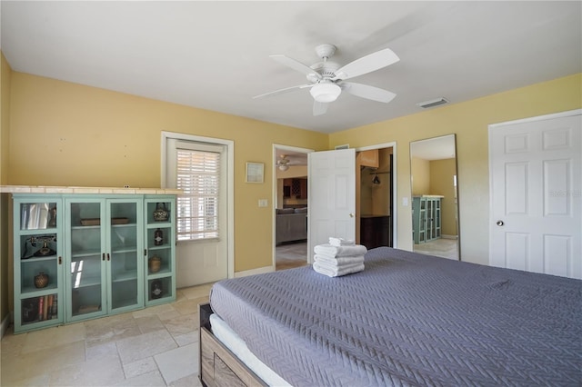 bedroom featuring ceiling fan