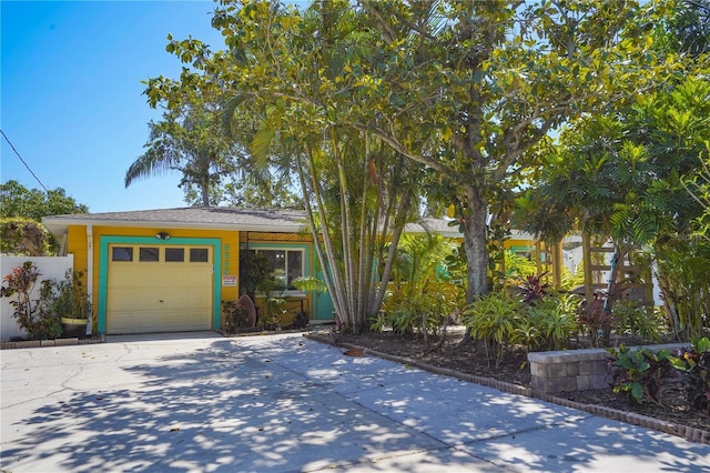 view of front of home featuring a garage