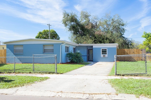 ranch-style house with a front yard