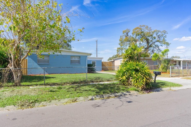 view of property exterior with a yard