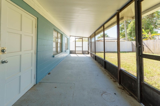 unfurnished sunroom with a healthy amount of sunlight