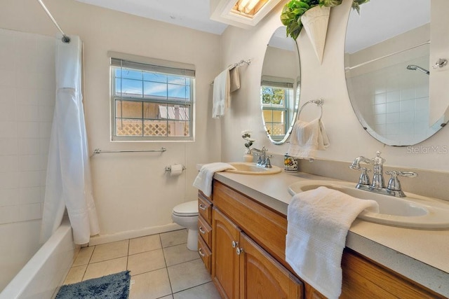 full bathroom with shower / bath combination with curtain, vanity, toilet, and tile patterned flooring