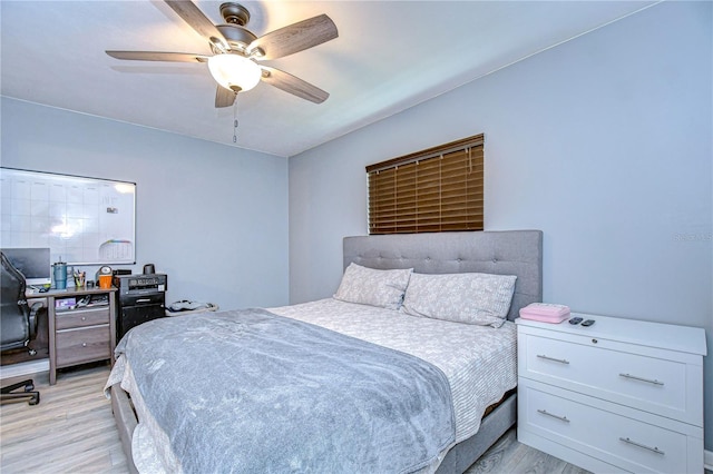 bedroom featuring ceiling fan and light wood-type flooring