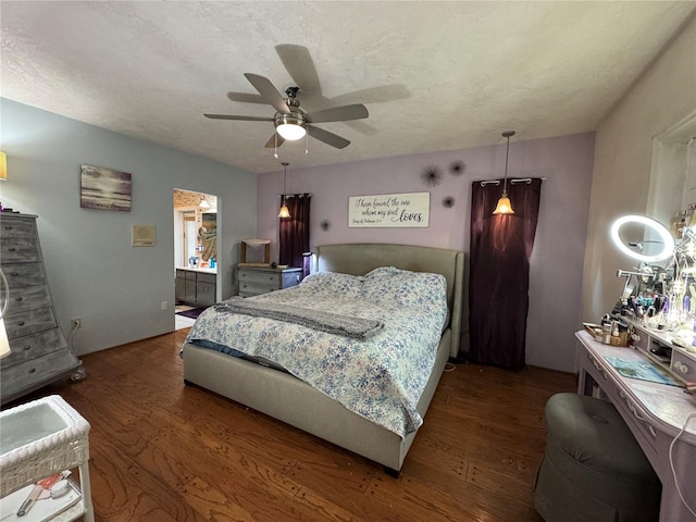 bedroom with a ceiling fan and wood finished floors