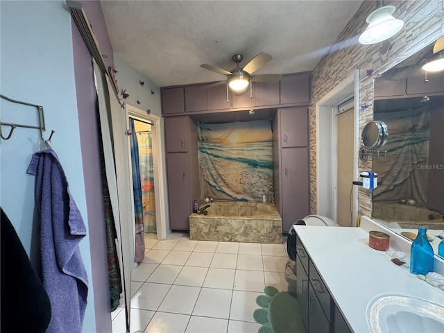 full bath featuring a ceiling fan, vanity, tile patterned floors, and a textured ceiling