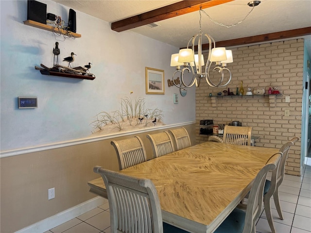 dining area featuring beamed ceiling, tile patterned floors, baseboards, and a notable chandelier