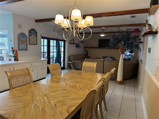 dining area with light tile patterned floors, french doors, beamed ceiling, a notable chandelier, and visible vents