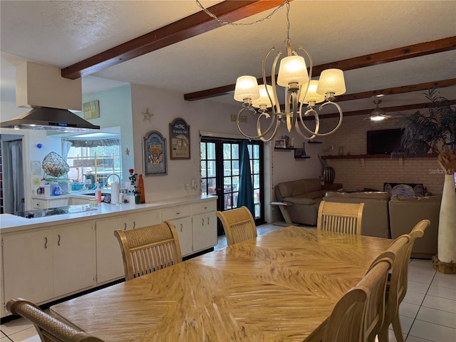 dining area with an inviting chandelier, beamed ceiling, and light tile patterned floors