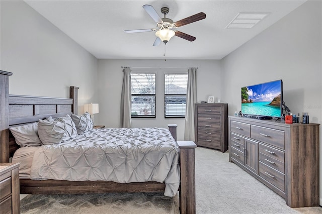 bedroom featuring light carpet and ceiling fan