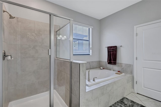 bathroom with plus walk in shower and tile patterned floors