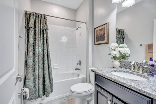 full bathroom featuring tile patterned flooring, vanity, shower / bath combination with curtain, and toilet