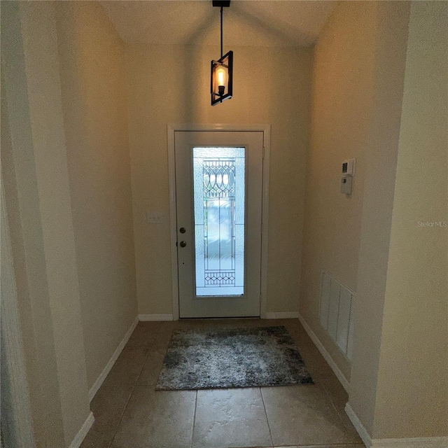 foyer with vaulted ceiling