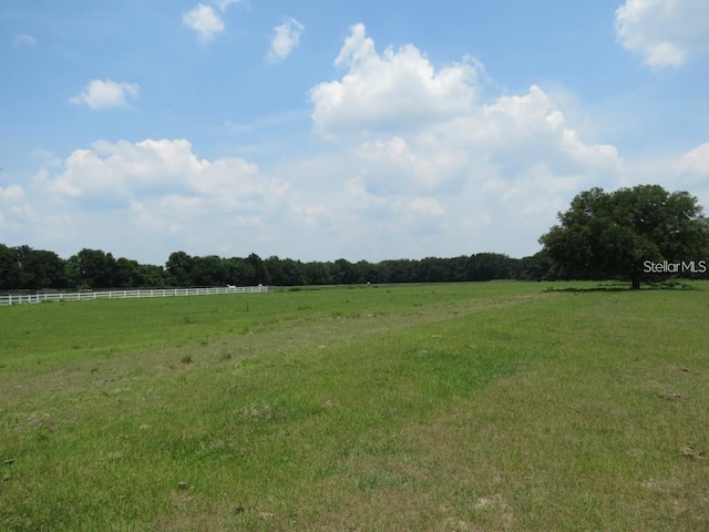 view of landscape with a rural view