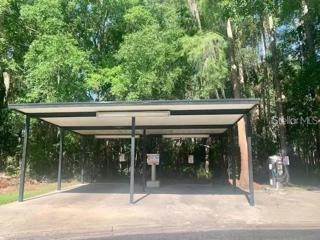 view of parking with a carport