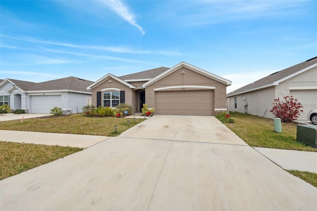 ranch-style home featuring a garage and a front yard