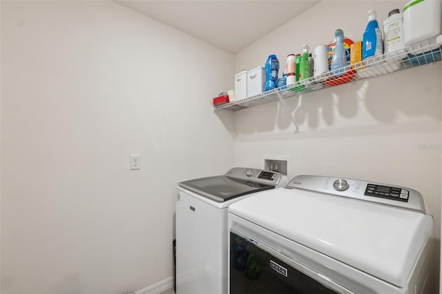 laundry room featuring independent washer and dryer