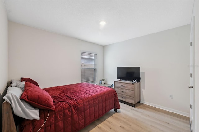 bedroom featuring light hardwood / wood-style floors