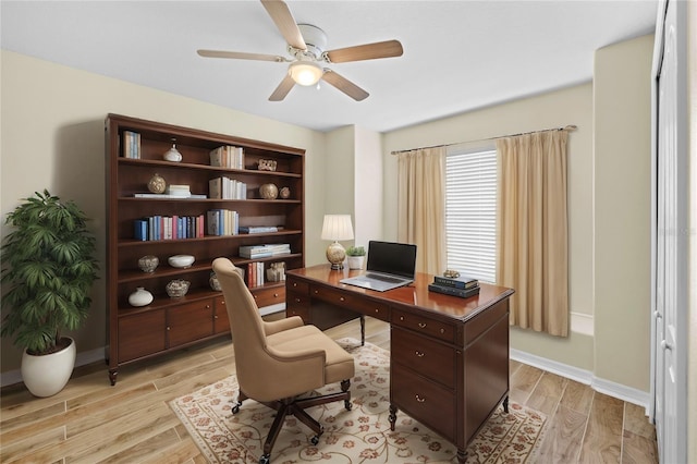 home office featuring ceiling fan and light wood-type flooring