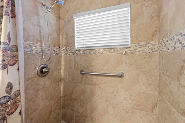 bathroom with curtained shower