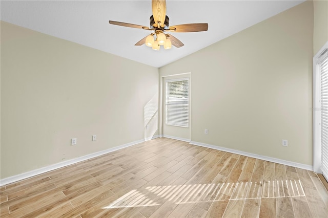 unfurnished room featuring lofted ceiling, light hardwood / wood-style flooring, and ceiling fan