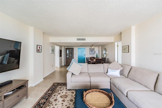 living room featuring a textured ceiling