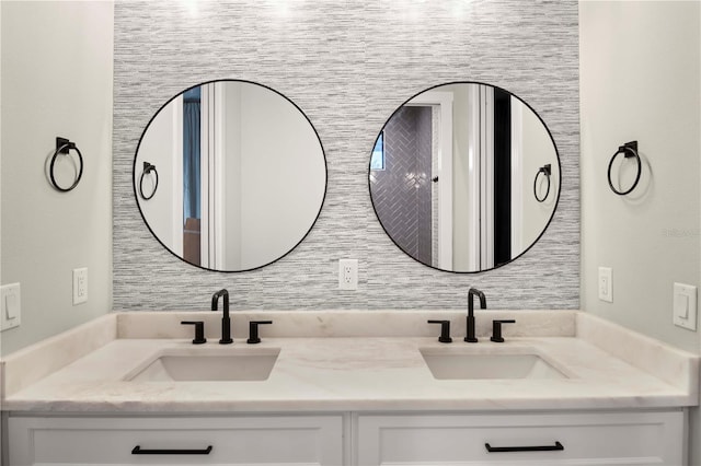 bathroom featuring vanity and backsplash