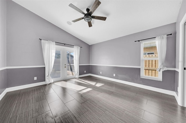 spare room with french doors, ceiling fan, and lofted ceiling