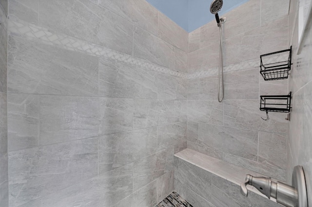 bathroom featuring tiled shower