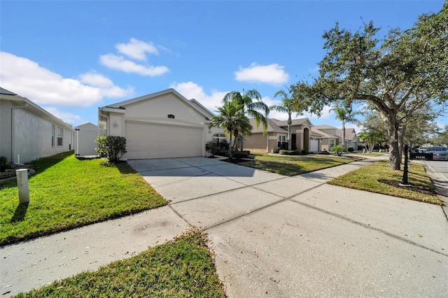 single story home featuring a garage and a front lawn