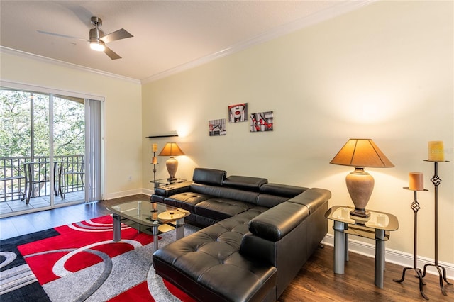 living room with ornamental molding, dark hardwood / wood-style floors, and ceiling fan