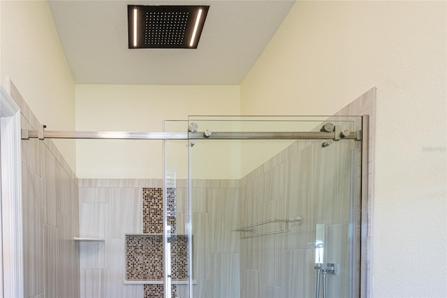 bathroom featuring an enclosed shower