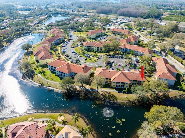 bird's eye view with a water view