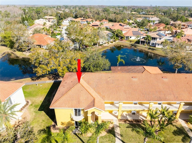 aerial view with a residential view and a water view