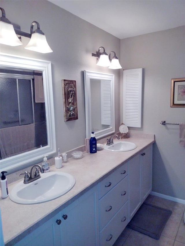 bathroom featuring vanity and tile patterned flooring