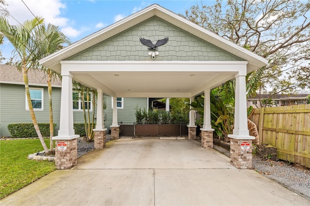 exterior space featuring a carport