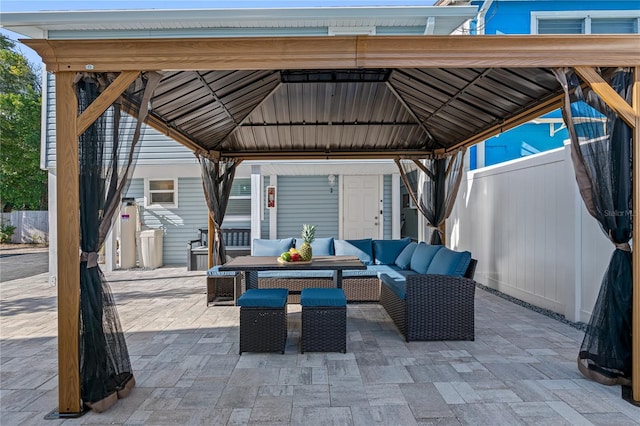 view of patio featuring a gazebo and an outdoor hangout area