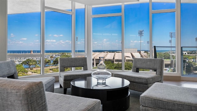 sunroom with a water view