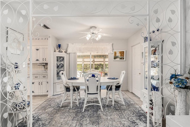 dining room with ceiling fan