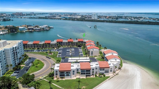 birds eye view of property featuring a water view