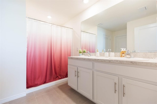 bathroom featuring tile patterned flooring, vanity, and a shower with shower curtain