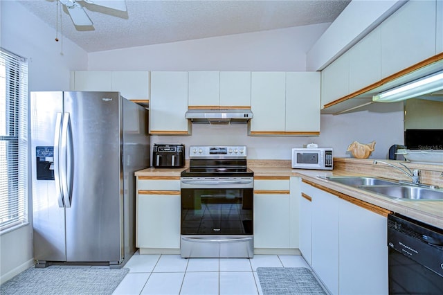 kitchen with white cabinetry, appliances with stainless steel finishes, sink, and plenty of natural light