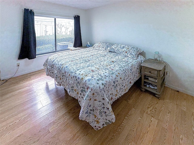 bedroom featuring light hardwood / wood-style floors