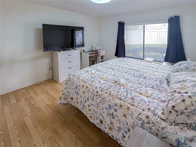 bedroom featuring light hardwood / wood-style flooring