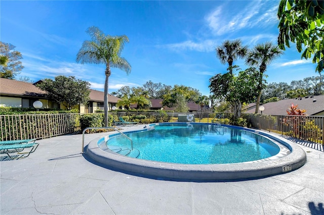 view of pool featuring a patio area