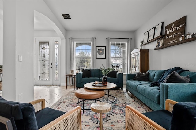 living room with light tile patterned flooring