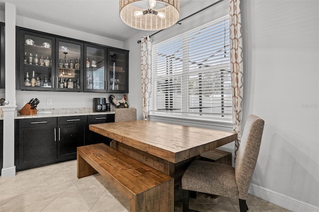 tiled dining room with bar