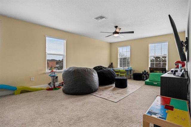 game room featuring ceiling fan and carpet floors