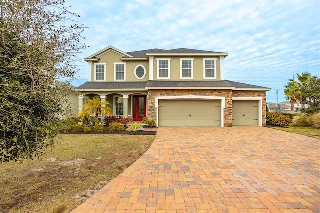 view of front of home with a garage and covered porch